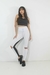 Conjunto Calça Legging Preto e Branco com Rasgo no Joelho e Cropped Preto na internet