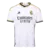 CAMISA REAL MADRID I 23/24 - ADIDAS TORCEDOR MASCULINA - BRANCO COM DETALHES EM AMARELO E PRETO