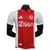 camisa-ajax-titular-home-casa-número-i-2024-2025-24-25-adidas-branca-branco-faixa-vermelha-gola-polo-retro-tres-listras-nuca-cruzes-amsterda-modelo-jogador