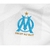 camisa-titular-olympique-de-marseille-2023-24-i-home-kit-branca-tonalidade-cinza-gola-punhos-azul-celeste-logo-puma-escudo-histórico-ligue-5