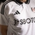 camisa-titular-home-casa-número-i-1-um-fulham-fc-2024-2025-23-24-adidas-branca-craven-cottage-arcos-vermelhos-gola-polo-preta-tradicional-tres-listras-pretas-detalhes-arquitetura-selo-especial-nuca-escudo-clube-patrocinio-sbotop-5