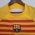 camisa-barcelona-número-iv-fouth-quarta-2023-2024-23-24-amarela-listras-vermelhas-gola-rendonda-amarela-escudo-tradicional-nike-preto-patrocinio-preto-3