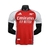 camisa-titular-home-casa-número-i-um-1-arsenal-2024-2025-adidas-vermelho-branco-canhao-retorno-histórico-azul-marinho-simbolo-iconico-emirates-visit-rwanda-premier-league-champions-league-modelo-jogador