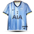 camisa-tottenham-especial-travis-scott-2024-25-24-25-nike-away-kit-azul-clara-faixas-verticais-gola-v-punhos-em-azul-marinho-logo-nike-azul-marinho-amarelo-branco-logo-travis-personalizacao-costa-rosto-olho-costurado-1