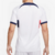 camisa-reserva-psg-número-ii-away-2023-2024-branca-faixa-degrade-vermelho-azul-marinho-gola-redonda-mangas-brancas-logo-nike-patrocinador-qatar-airways-bandeira-franca-4