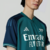 camisa-terceira-third-kit-número-iii-tres-3-arsenal-2023-2024-23-24-adidas-verde-ombros-azul-marinho-estilo-retro-modernizado-gola-v-punhos-refinados-logo-exclusivos-patrocínios-off-white-premier-league-champions-league-5