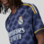 camisa-real-madrid-número-ii-away-fora-2023-2024-23-24-azul-marinho-simbonilizando-infinito-ondas-azul-claro-gola-redonda-azul-marinho-escudo-tradicional-vini-jr-rodrygo-bellingham-mbappe-kroos-5