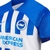 camisa-titular-home-casa-número-i-1-um-brighton-hove-albion-2023-2024-23-24-nike-azul-royal-listras-brancas-gola-v-punhos-azul-marinho-3