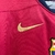 camisa-barcelona-número-i-home-casa-2024-2025-24-25-design-meio-a-meio-azul-marinho-bordo-vermelho-mangas-alternadas-escudo-tradicional-centralizado-logo-nike-e-spotify-dourado-5