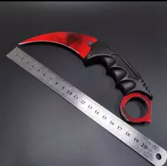 CUCHILLO KERAMBIT COLOR ROJO CON FILO FUNDA NEGRA PLÁSTICO RÍGIDO (A22-5) - comprar online