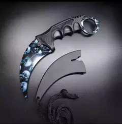 CUCHILLO KERAMBIT DISEÑO CALAVERA CON FILO FUNDA NEGRA PLÁSTICO RÍGIDO (A22-2) - comprar online