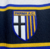 Camisa-Parma-Retrô-Away-02-04-cor-branca-com-listras-amarelas-azuis-Champion-torcedor-cor-preta-gola-v