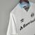 Camisa-Grêmio-II-22-23-Torcedor-Umbro-branco-banrisul-preto-azaul-claro-gola-v