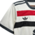 Camisa-Manchester-United-24-25-Away-adidas-vermelho-branco-preto-snapdragon-gola-redonda