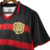 Camisa-Sport-I-24-25-Torcedor-Umbro-cor-preta-vermelho-gola-v-escudo-bordado-amarelo