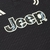 Detalhe da camisa Juventus III 23/24 com o logotipo da Jeep em destaque.