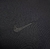 Logo da Nike em uma camisa preta de torcedor Corinthians II 24/25.