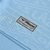 Detalhe da etiqueta da camisa Lazio I 24/25 da Mizuno, destacando a cor azul e o logo da marca.