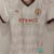 Camiseta Manchester City blanca cuello marrón niño