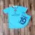 Camiseta Manchester City celeste cuello rojo niños