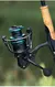 Molinete Carpa Spinning Reel - Metalizado, Grip EVA, 10kg Drag, Modelos HE500-7000