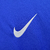 Logotipo da Nike bordado em uma camisa azul da Seleção da França.