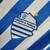 Logo da camisa CSA I 24/25, com as palavras "UNIÃO E FORÇA" em destaque e detalhes em azul e branco.