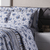 Imagem do Kit Colcha Cobre Leito Casal e 2 Porta-travesseiros Dupla-Face Floral e Listrado Azul