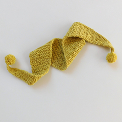 Mini Bufanda Pompones amarillo en internet