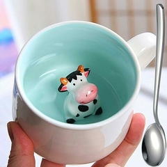 taza de té estatuilla vaca