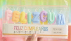Velas feliz cumpleaños pastel