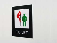 Cartel "Toilet Hombre Mirón Gay"