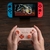 8BITDO ULTIMATE C BLUETOOTH CONTROLLER FOR SWITCH WITH 6-AXIS MOTION CONTROL AND RUMBLE VIBRATION (ORANGE) en internet