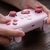 8BITDO ULTIMATE C BLUETOOTH CONTROLLER FOR SWITCH WITH 6-AXIS MOTION CONTROL AND RUMBLE VIBRATION (PINK) en internet