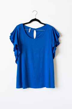 Blusa FIAMA, Blusa de lino elastizado cuello redondo con volados y botón en espalda para acceder - tienda online