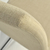 Detalle del respaldo de la silla SIMET 549, con tapizado de tela Spazio en color beige, suave y resistente.