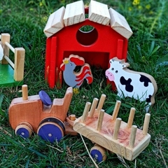 La granja con animales y tractor kuñul