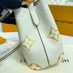 BOLSA NÉONOÉ BB CREME/SAFRAN MONOGRAM GIANT - loja online