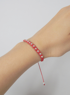 Pulsera Macrame roja con bolitas en internet