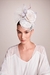 Graciella Starling, Haute millinery. Fascinator with white base and voielette and off-white silk flower, perfect for weddings. Inspired by Princess Kate Milleton. Can be worn for day or evening events. Perfect for country or beach brides