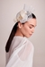 Made by Graciella Starling, the Haute Chapelry. Off-white fascinator with a side, perfect for weddings. It can be called a cap. Inspired by Princess Kate Mildleton. It can be worn for day or night events.