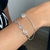 PULSEIRA FIO CARTIER COM CORAÇÃO VAZADO - comprar online