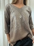 SWEATER ESCOTE V LUREX en internet