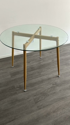 Mesa Tulip de vidrio de 1 metro con patas de simil madera, diseño elegante y moderno.