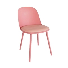 Silla Vita de PVC rosa con diseño moderno y patas delgadas.