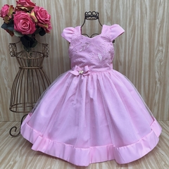 Vestido de festa infantil rosa com bordados delicados e laço, ideal para festas.