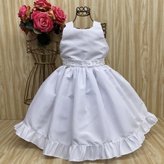 Vestido de festa infantil Floratta, branco, com saia rodada e detalhes em renda na cintura.