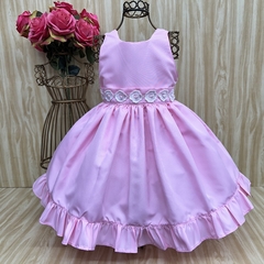 Vestido de festa infantil Floratta na cor rosa, com detalhes em renda e saia rodada.