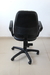 Imagen de Silla de escritorio Rudy alta con brazos ergonómica negra con tapizado de cuero sintético