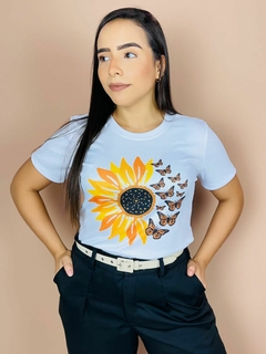 T-shirt Canelada Girassol e borboletas na internet